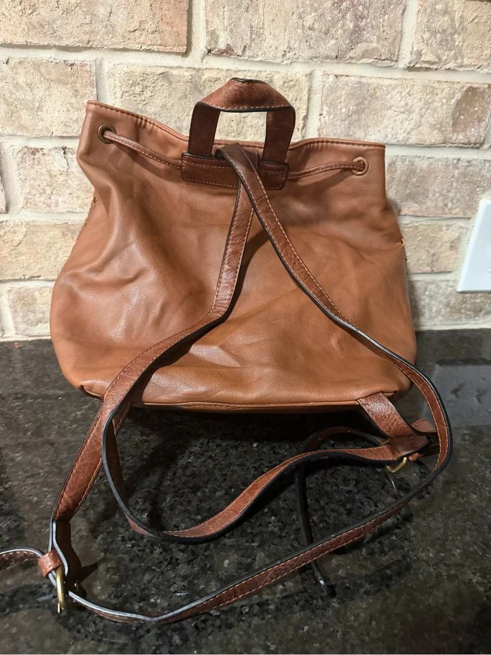 Altar'd State Woven Leather Tassel Backpack in Brown